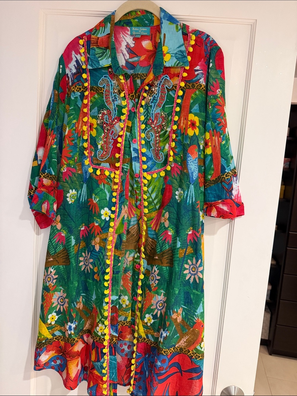 Colorful Green & Red Girls' Tropical Button-Front Dress with Pom Trim